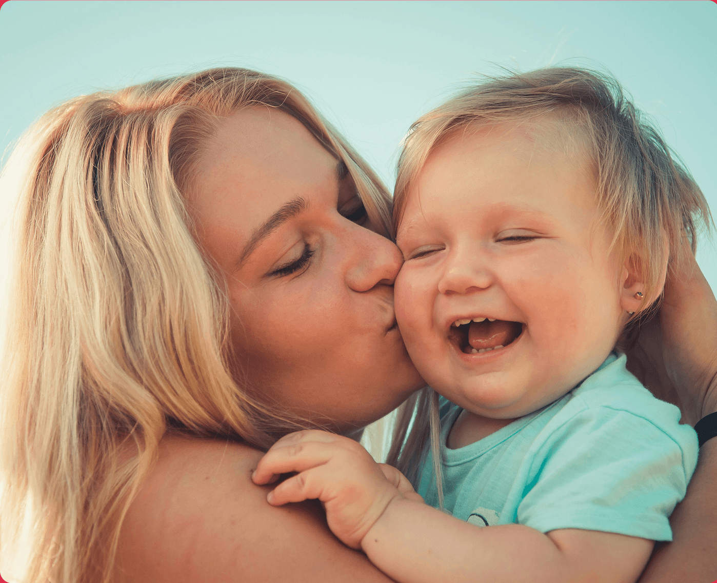 An image of a mother carrying baby