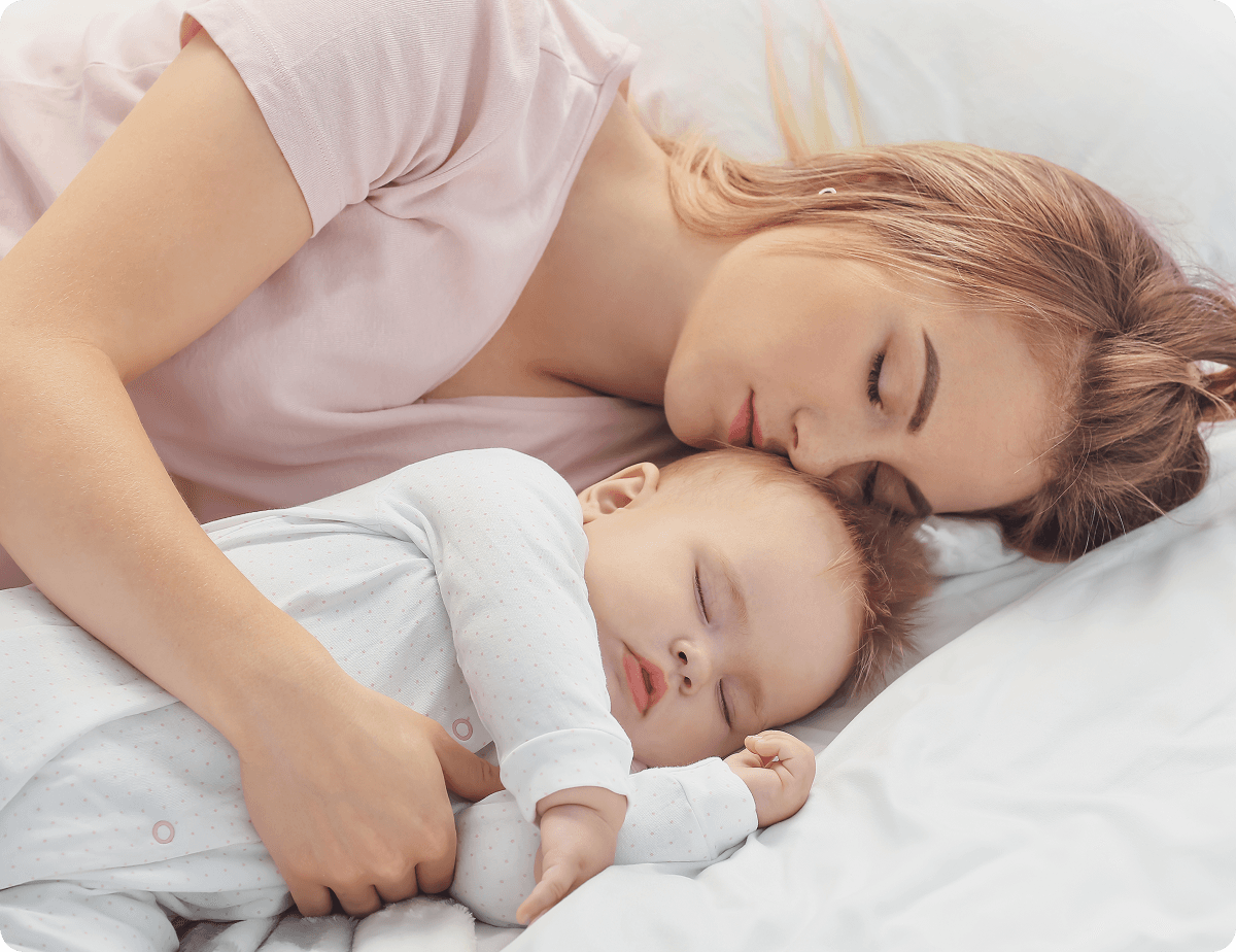 Who are we image, A mother sleeping near her baby